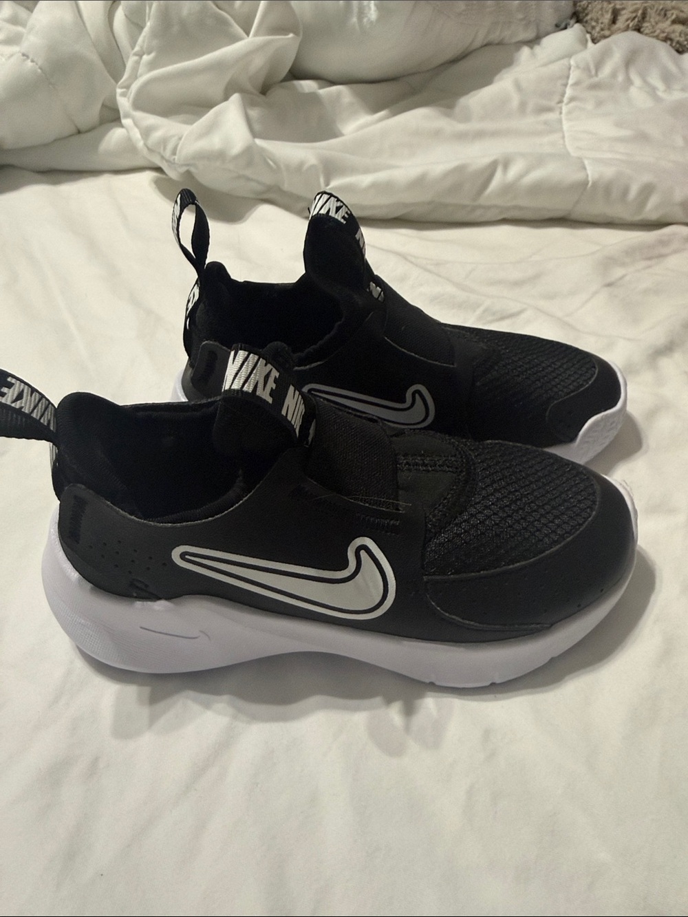 Nike Kids Black and White Slip-On Sneakers